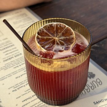 The Burrow - The Battle of Schrute Farm (tequila, rhubarb, beet & orange juice syrup, lime. - Burgers Near Me - Pensacola, Florida The Burrow - The Battle of Schrute Farm (tequila, rhubarb, beet & orange juice syrup, lime. - Burgers Near Me - Pensacola, Florida