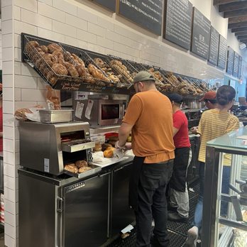 Tompkins Square Bagels -  2nd Ave - The see them work line of bagel workers - Bagels Near Me - New York, New York
