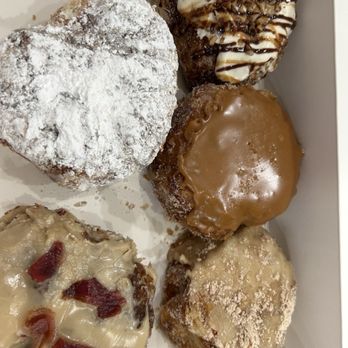 Parlor Doughnuts - Top corner is turtle cheesecake filled- so good! - Donuts Near Me - Terre Haute, Indiana