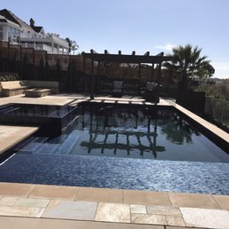Sapphire Iridescent collection with clear step trimiridescent using black grout under