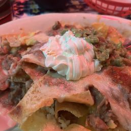 Nachos Platter! ~$13 This was more than filling and had nacho and shredded cheeses! Shared this between two people.