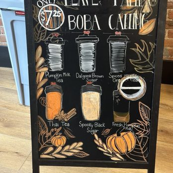 Peekskill Boba - A black chalkboard sign displays fall-themed boba drinks with illustrations, including pumpkin milk tea, Dalgona brown sugar, spiced apple green tea, Thai tea, spooky black sugar, and fresh pumpkin milk. - Bubble Tea Near Me - Peekskill, New York