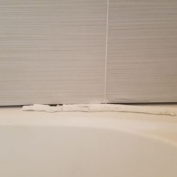 MCCS - Half inch gaps between new tiles and bathtub.. gap is too wide to seal properly with just caulking. - Handyman Near Me
