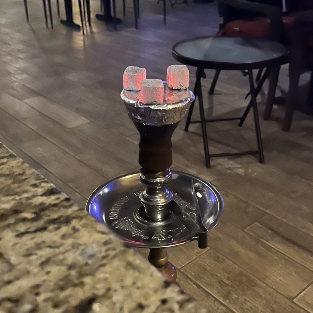 a glass of wine on a table