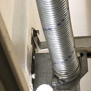 Duke's Garage Doors - Bracket. Loose screw.
The spring was the part replaced. - Garage Door Services Near Me - Ocala, Florida Duke's Garage Doors - Bracket. Loose screw.
The spring was the part replaced. - Garage Door Services Near Me - Ocala, Florida