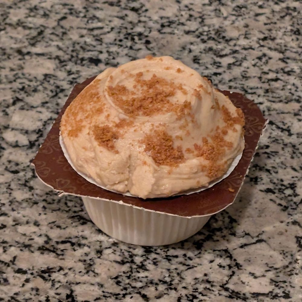 Frosted Cupcakery - Royal White Cookie Butter Cupcake. First bite was fantastic, but the remaining bites? Not so much. There's also a wrapper within the wrapper - Bakeries Near Me - Long Beach, California
