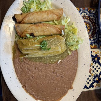 Tequila's Bar & Grill - Chicken tamales with chicken Taquitos and beans - Mexican Near Me - Van Nuys, California Tequila's Bar & Grill - Chicken tamales with chicken Taquitos and beans - Mexican Near Me - Van Nuys, California