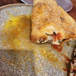 Sicilys Pizza & Subs Pasta - 1/8"+ of water (I hope) with congealed butter and grease as my plate was delivered.  Disgusting.