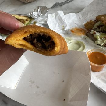 Patacon Latin Cuisine - Empanada ground beef - Venezuelan Near Me - Lafayette, Louisiana Patacon Latin Cuisine - Empanada ground beef - Venezuelan Near Me - Lafayette, Louisiana