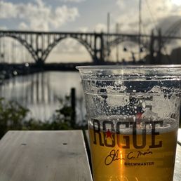 a glass of beer on a table