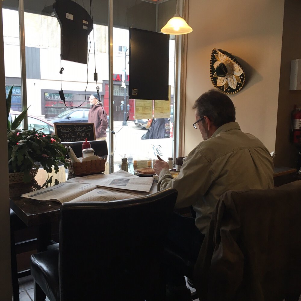 Christina's Eatery - a man sitting at a table - Breakfast & Brunch Near Me - St Catharines, Ontario