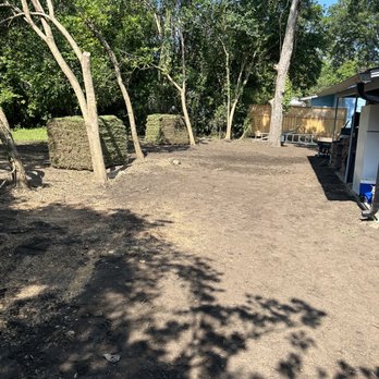 Luxurious Landscaping & Design - the back of a house with a fenced in area - Landscaping Near Me Luxurious Landscaping & Design - the back of a house with a fenced in area - Landscaping Near Me