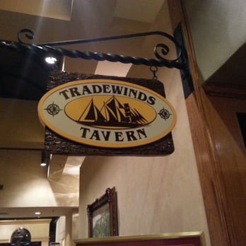 Tradewind's Tavern - a sign hanging from the ceiling - Seafood Near Me - Beaumont, Texas Tradewind's Tavern - a sign hanging from the ceiling - Seafood Near Me - Beaumont, Texas