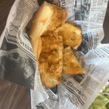 Pino's Pizza & Restaurant - Delicious garlic bread with our meals (after my son dove in) - Pizza Near Me - Woodbridge, New Jersey
