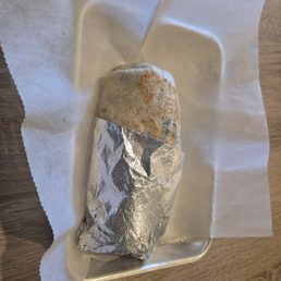 Veggie burrito with avocado, peppers, onions, mushrooms, and potatoes. They have options to add chicken or beef as well