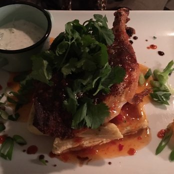Fresh & Co - Chicken, savory waffle, mango sauce, arugula, a sweet square of honeycomb ~ ambrosia! - New American Near Me - Camden, Maine Fresh & Co - Chicken, savory waffle, mango sauce, arugula, a sweet square of honeycomb ~ ambrosia! - New American Near Me - Camden, Maine