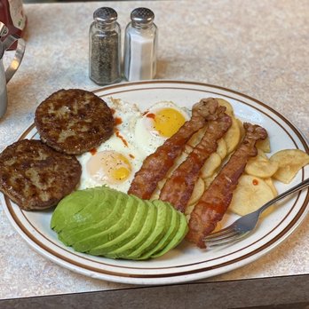 Pondfield Cafe - Sunny side eggs with avocado, bacon, sausage and potatoes. - Breakfast & Brunch Near Me - Bronxville, New York Pondfield Cafe - Sunny side eggs with avocado, bacon, sausage and potatoes. - Breakfast & Brunch Near Me - Bronxville, New York