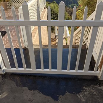 JH Landscaping & Construction - a white picketed gate - Landscaping Near Me