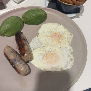 OEB Breakfast - Downtown - The Classic with over medium eggs, blueberry chicken bangers, potatoes fried in beef tallow, and avocado (subbed for the toast). - Breakfast & Brunch Near Me - Calgary, Alberta