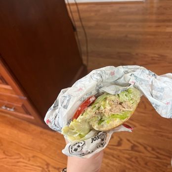 Jimmy John's - a hand holding a sandwich wrapped in foil - Sandwiches Near Me - Crestview Hills, Kentucky Jimmy John's - a hand holding a sandwich wrapped in foil - Sandwiches Near Me - Crestview Hills, Kentucky
