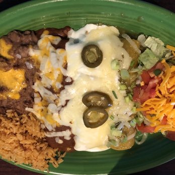Blue Goose Cantina - Enchilada combination: beef, chicken, and cheese. - Tex-Mex Near Me - Grapevine, Texas Blue Goose Cantina - Enchilada combination: beef, chicken, and cheese. - Tex-Mex Near Me - Grapevine, Texas