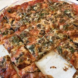 Sausage, mushroom and spinach large tavern pizza. Sausage, mushroom and spinach large tavern pizza.