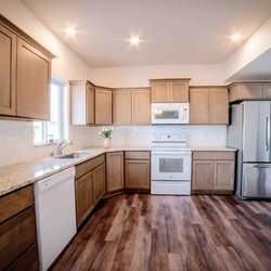 Photo Art By Laura Photography Studio - Kitchen view- Natural light flare from can spotlights.