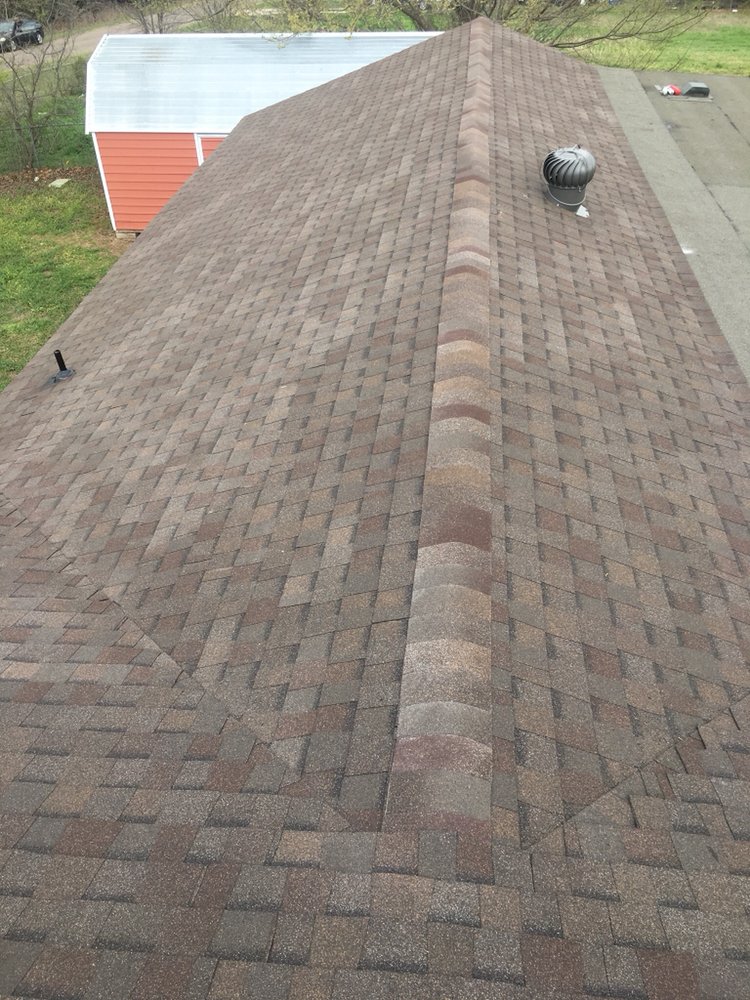 Slide of SNE Roofing & Remodeling