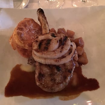 Fat Canary - Here is their amazing pork chop. Don't bother reading the menu. Just ask for it when seated and thank me later. - New American Near Me - Williamsburg, Virginia
