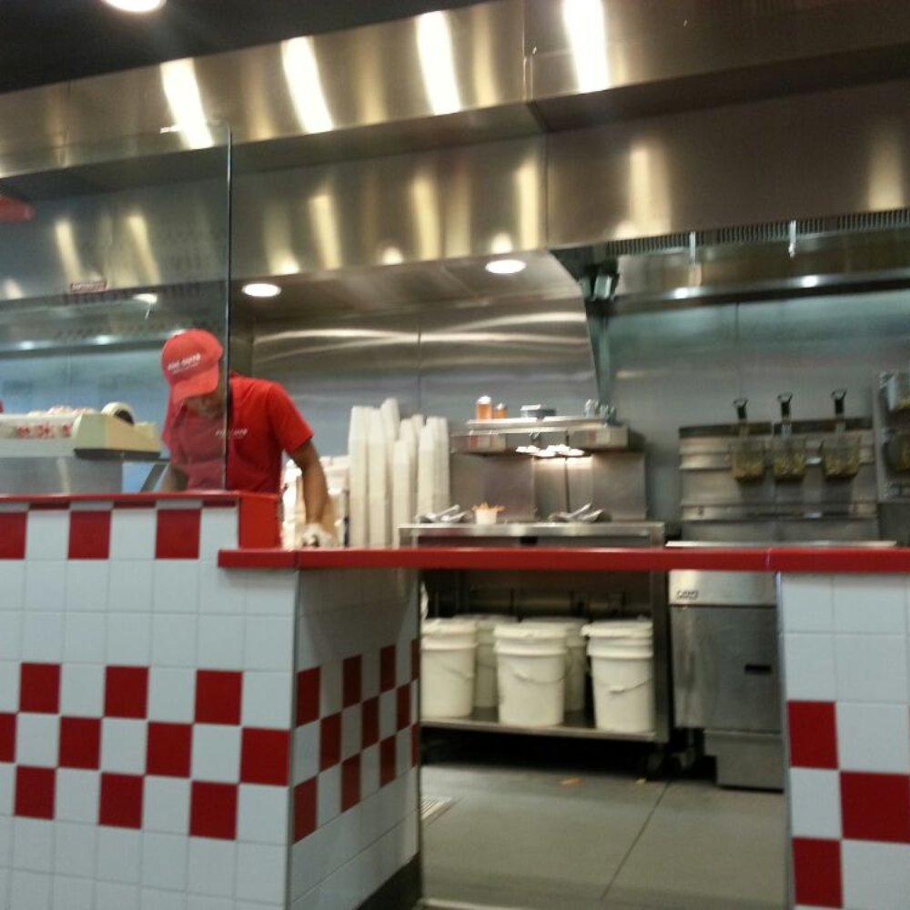 Five Guys - Cooks in action - Burgers Near Me - Fresh Meadows, New York