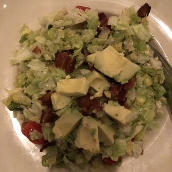 Maggiano's Little Italy - CHOPPED SALAD Smoked Bacon, Tomatoes, Avocado, Blue Cheese, House Dressing. - Italian Near Me - Annapolis, Maryland