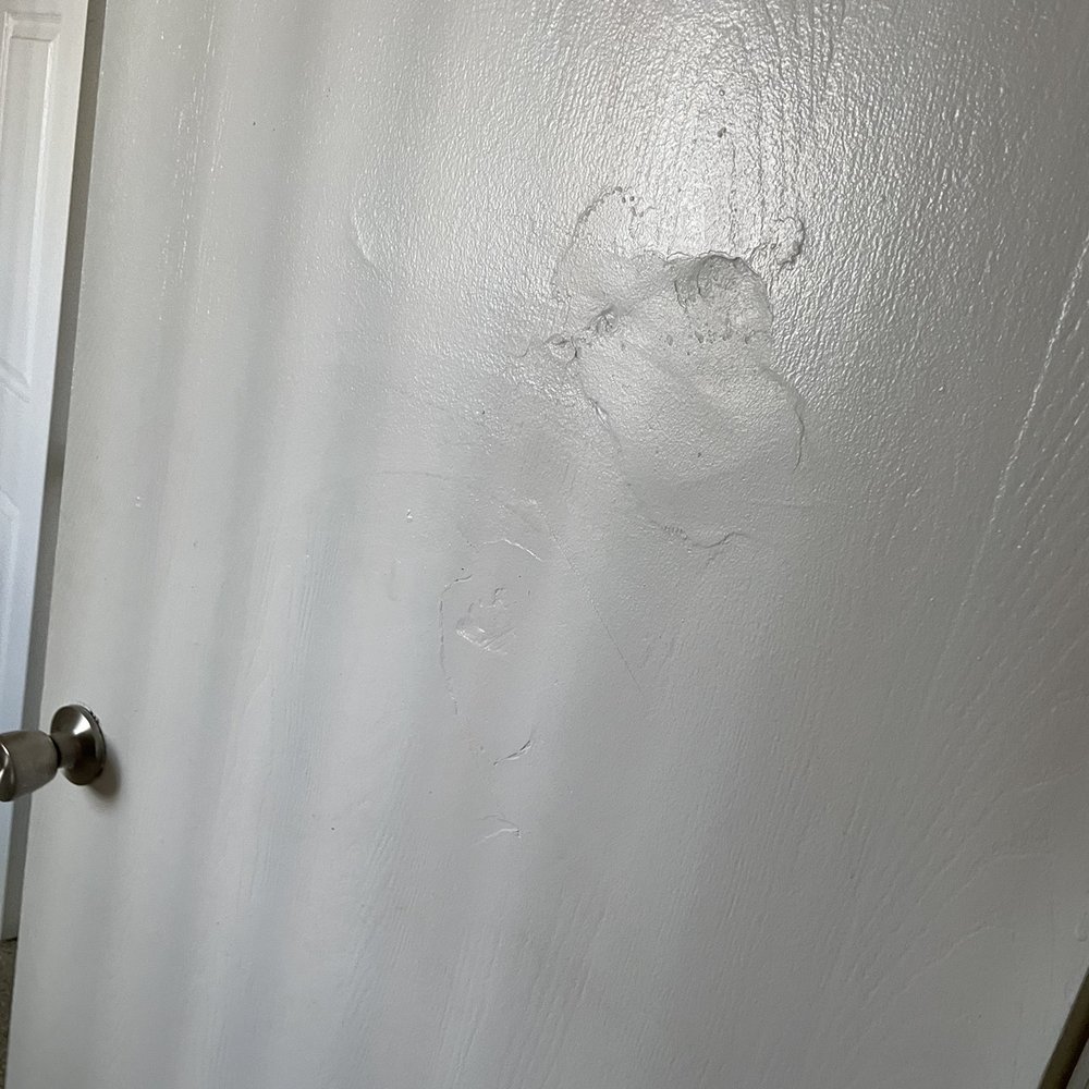 The Perch on 52nd - Someone or something has punched/run in to the door and instead of replacing the cheap door they do a shitty repatch job - Apartments Near Me - Arvada, Colorado The Perch on 52nd - Someone or something has punched/run in to the door and instead of replacing the cheap door they do a shitty repatch job - Apartments Near Me - Arvada, Colorado