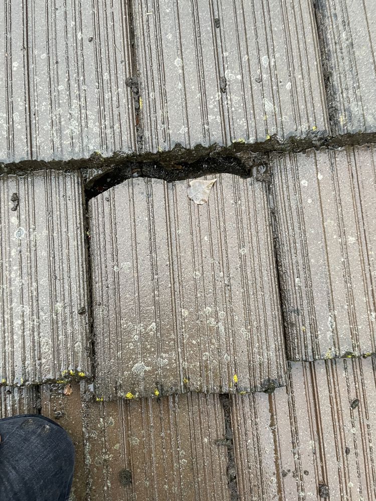 Slide of The Roofing Co