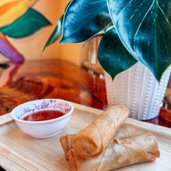 Thai Mango - #1 the hand rolled vegetarian spring rolls with house made sweet & sour sauce!