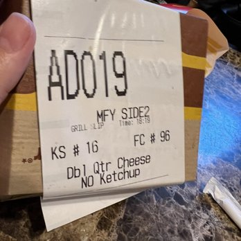 McDonald's - a hand holding a ticket for a mcdonald's burger - Fast Food Near Me - San Bernardino, California McDonald's - a hand holding a ticket for a mcdonald's burger - Fast Food Near Me - San Bernardino, California