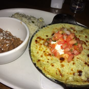 Blanco Cocina + Cantina - Chicken enchiladas w red sauce. Enchilada stacked like lasagna so juicy, super perfect consistency. - Tacos Near Me - Phoenix, Arizona