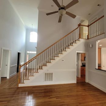 Smith Painting - a staircase leading to a second floor - Painters Near Me Smith Painting - a staircase leading to a second floor - Painters Near Me