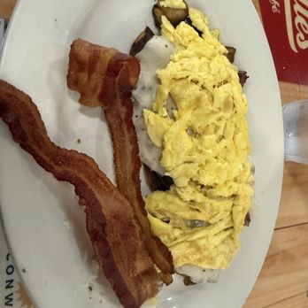 Dixie Belle's Cafe - Home fries, sausage gravy, scrambled eggs with a side of bacon. - Breakfast & Brunch Near Me - Orlando, Florida