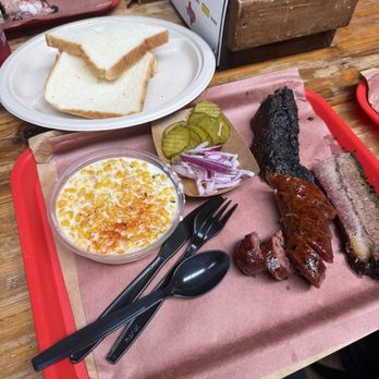 Terry Black's Barbecue - Brisket, original sausage, cream corn, pickles and onion, bread - Barbeque Near Me - Dallas, Texas Terry Black's Barbecue - Brisket, original sausage, cream corn, pickles and onion, bread - Barbeque Near Me - Dallas, Texas