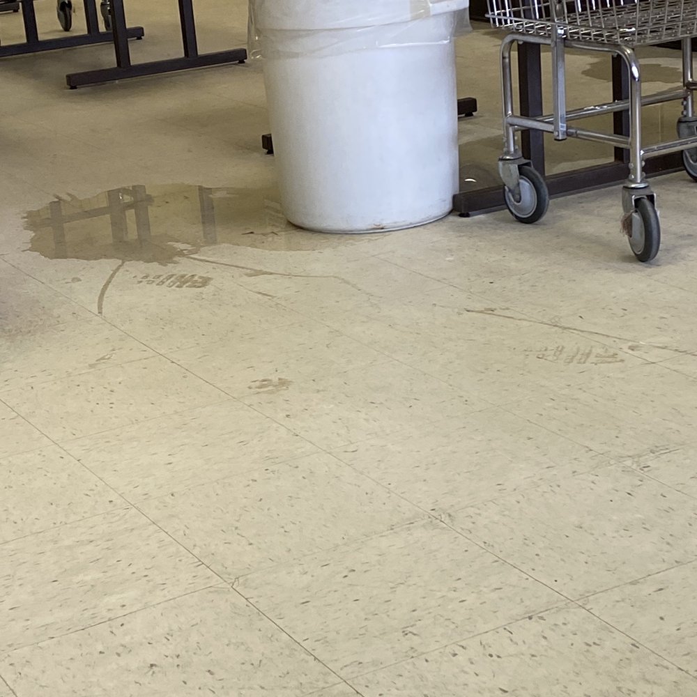 Huge puddle on floor from washing machine