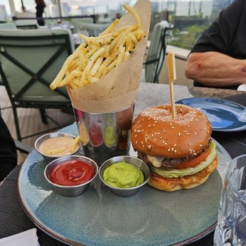 The Rooftop - Cheeseburger and crispy fries with great salt and parsley - Asian Fusion Near Me - Beverly Hills, California The Rooftop - Cheeseburger and crispy fries with great salt and parsley - Asian Fusion Near Me - Beverly Hills, California