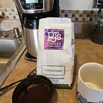 PJ's Coffee - a cup of coffee next to a blender - Coffee & Tea Near Me - Spanish Fort, Alabama