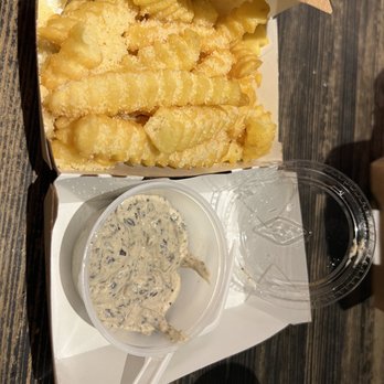 Shake Shack Winter Park - Garlic Parmesan black truffle fries - Burgers Near Me - Winter Park, Florida Shake Shack Winter Park - Garlic Parmesan black truffle fries - Burgers Near Me - Winter Park, Florida
