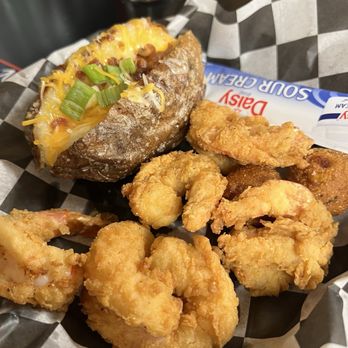 The Lighthouse Restaurant - Fried shrimp & loaded baked potato - Seafood Near Me - Irvington, Alabama The Lighthouse Restaurant - Fried shrimp & loaded baked potato - Seafood Near Me - Irvington, Alabama