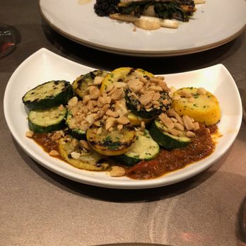 Sepia - Grilled Zucchini (romesco, marcona almonds - $8) - New American Near Me - Chicago, Illinois Sepia - Grilled Zucchini (romesco, marcona almonds - $8) - New American Near Me - Chicago, Illinois