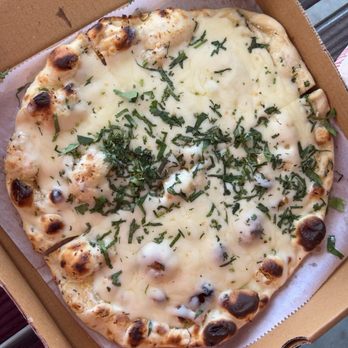 Tikka Indian Cuisine - Garlic cheese naan - Indian Near Me - Venice, Florida Tikka Indian Cuisine - Garlic cheese naan - Indian Near Me - Venice, Florida