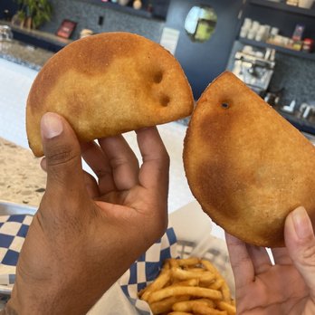 Milly's Empanada Factory - This is the only picture because we ate it all. Dots are to indicate your empanadas :')   Precious - Venezuelan Near Me - Miami, Florida
