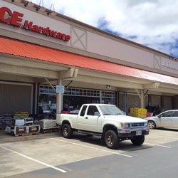 Ace Hardware and Bank of Hawaii on one end of the shopping center where you can plug in your electric car.