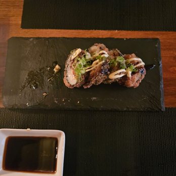 O-Ku - Scallop and shrimp cooked roll. Yummy sauce on top. Delicious! - Sushi Bars Near Me - Raleigh, North Carolina