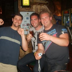 Australian guys playing Wii PUB GAMES